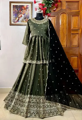 Featuring chinon silk kurti & lehenga with elegant dupatta in georgette with beautiful sequins embroidery