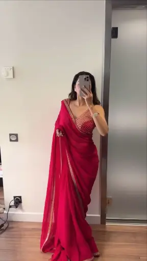 Beautiful Designer Saree on Faux Georgette Febric with Thred & Sequence work and Blouse on also Faux Georgette Febric With Thred & Sequence work